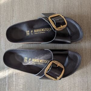 Birkenstock Black Slide Sandals with Gold Ornate Buckles